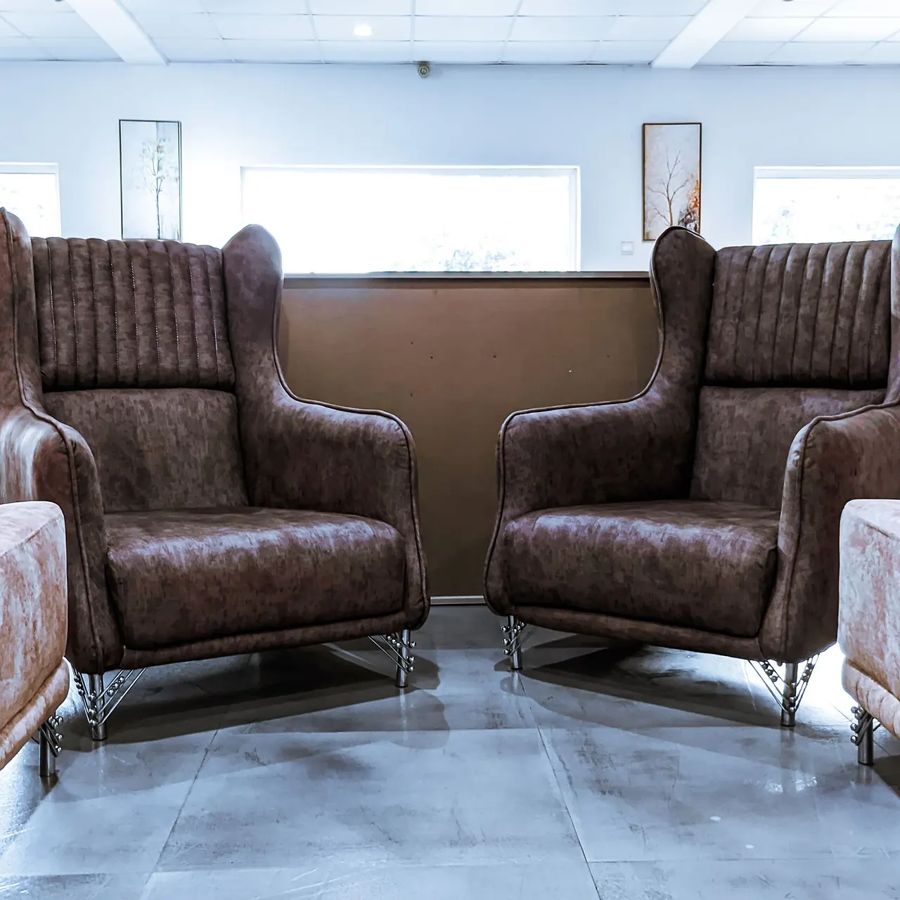 Leather armchairs arranged in a lounge setting