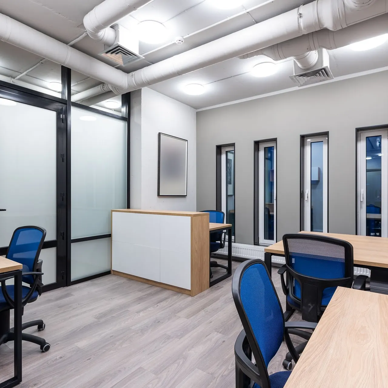 Office furnished with new desks, chairs and storage units