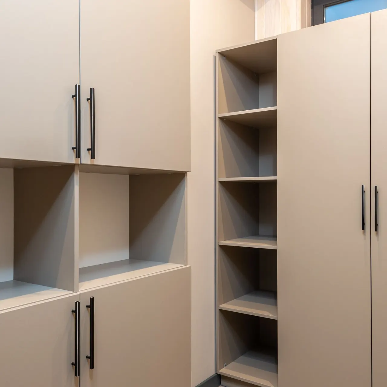 Built-in storage unit with empty open shelves