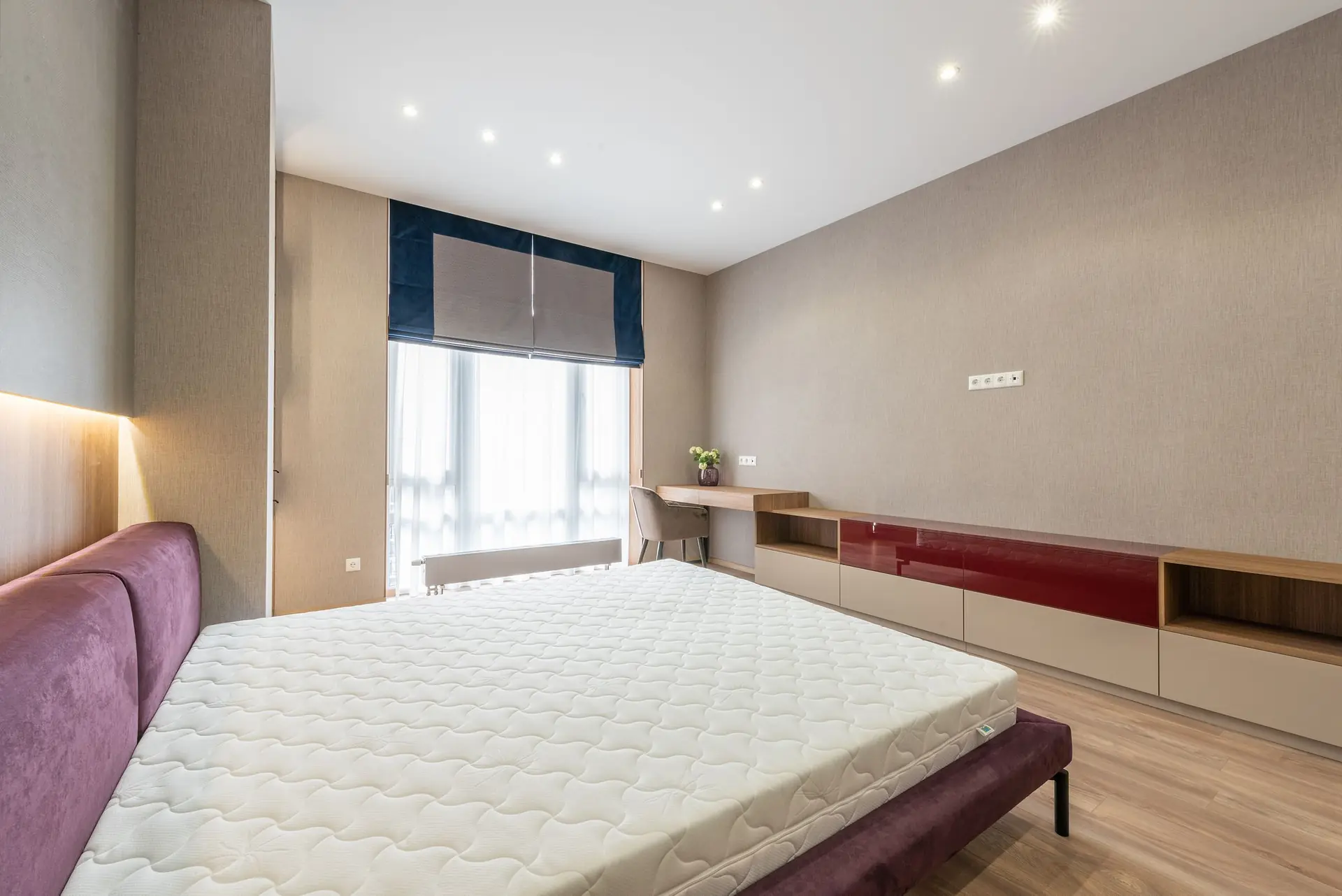 Stylish bedroom with a fitted cupboard