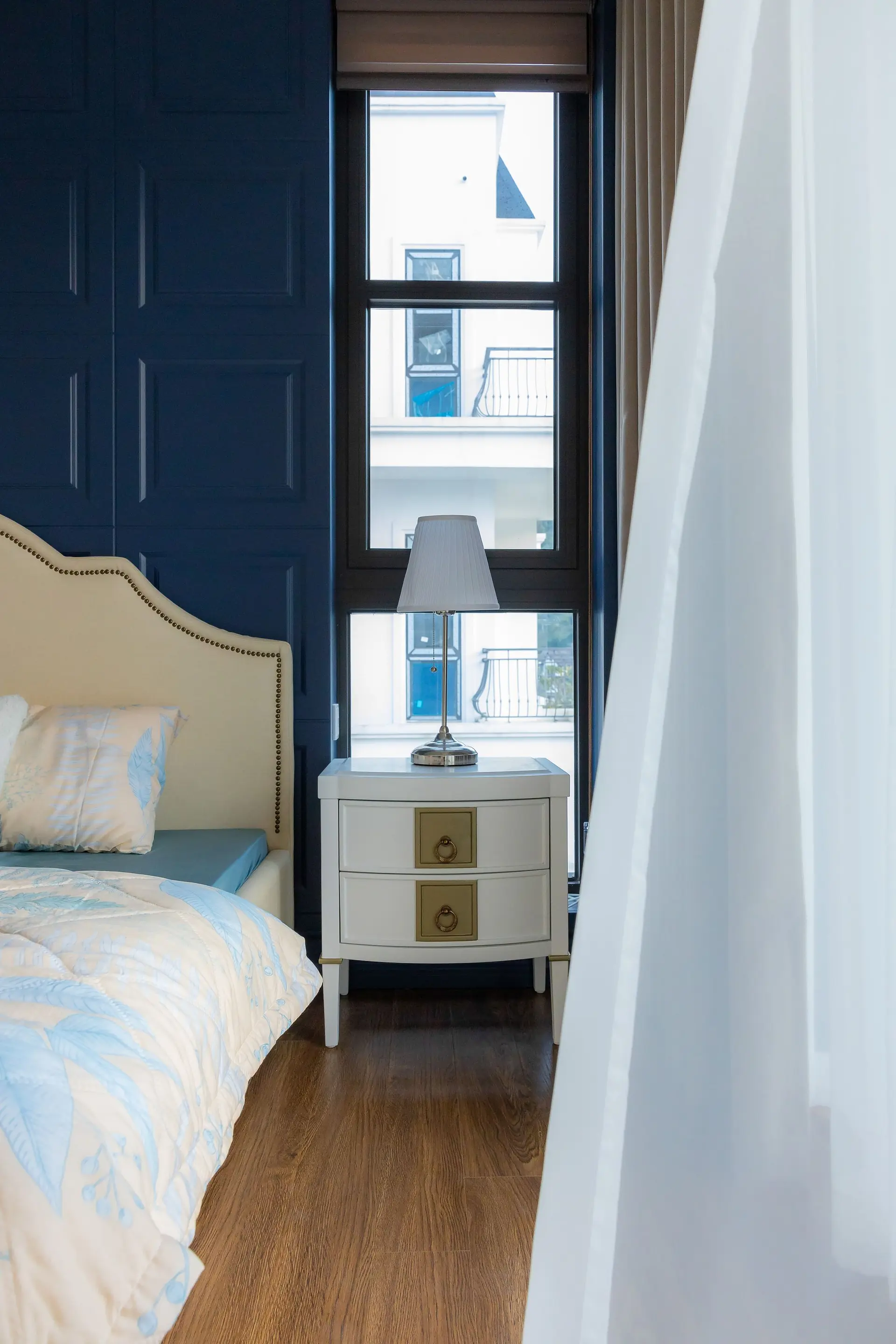 Bedroom with blue accents and natural light