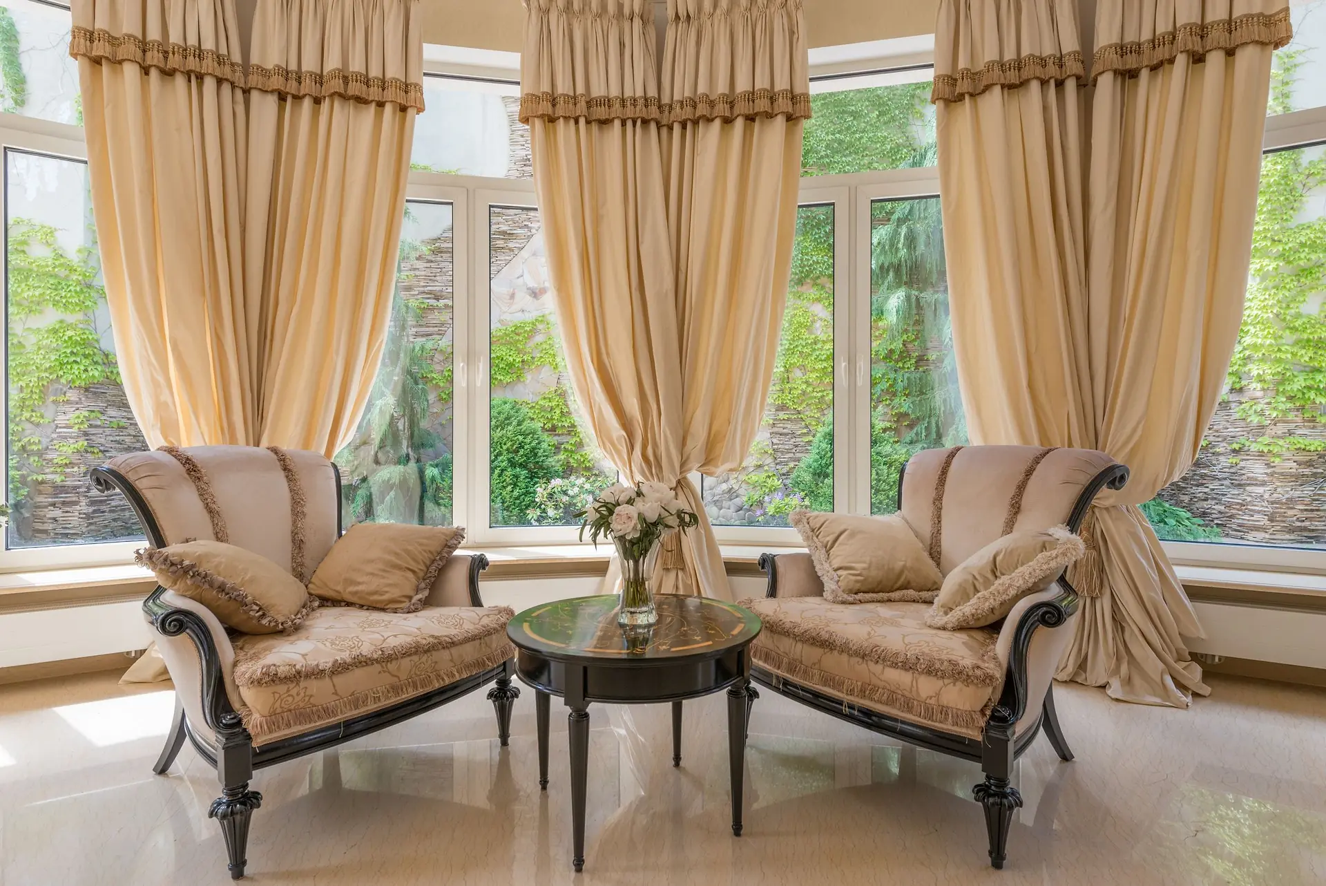 Lounge with large windows and comfortable armchairs