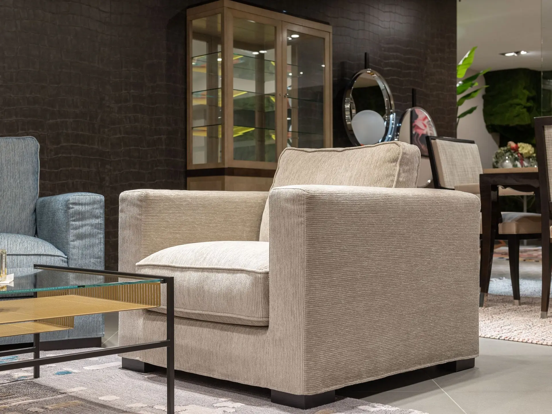 Upholstered armchair in a styled living room