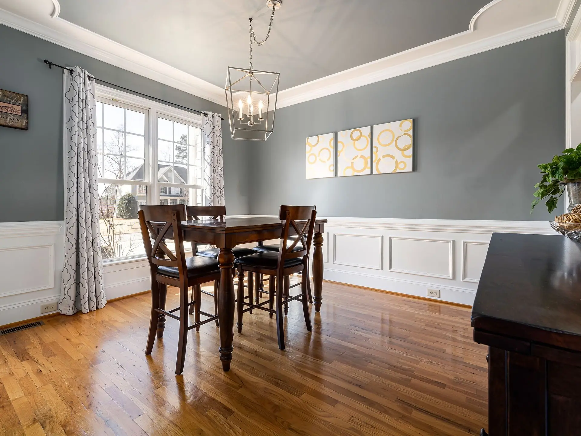 Spacious dining room with a full table setting
