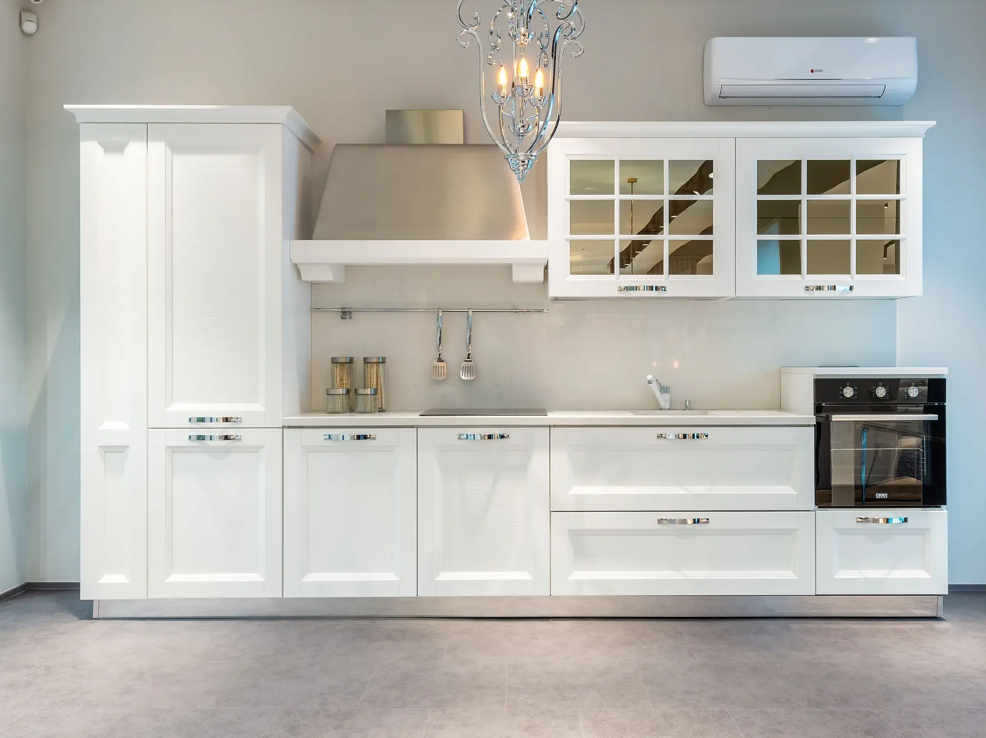 White fitted kitchen with modern appliances
