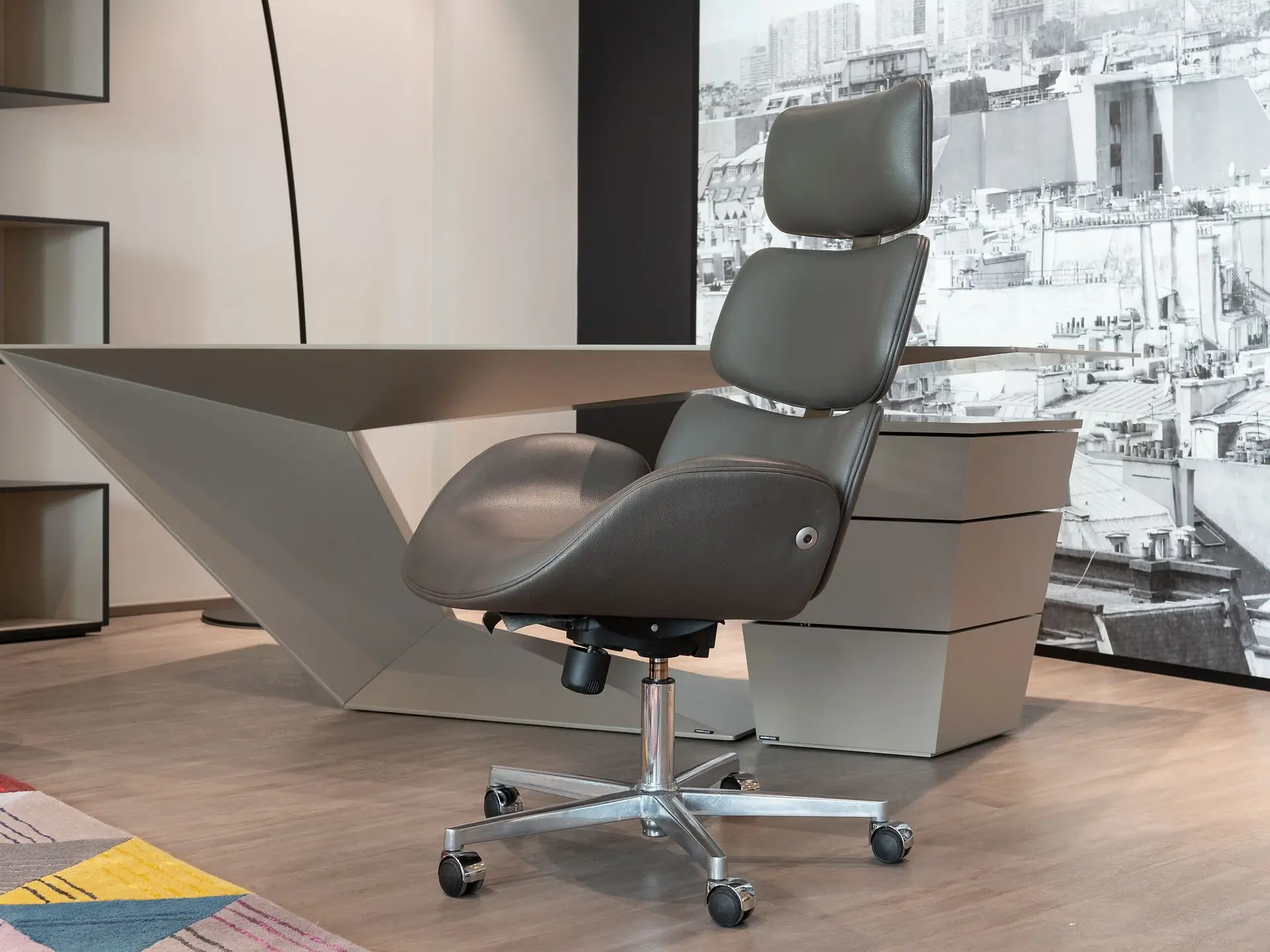 Grey office chair at a modern desk