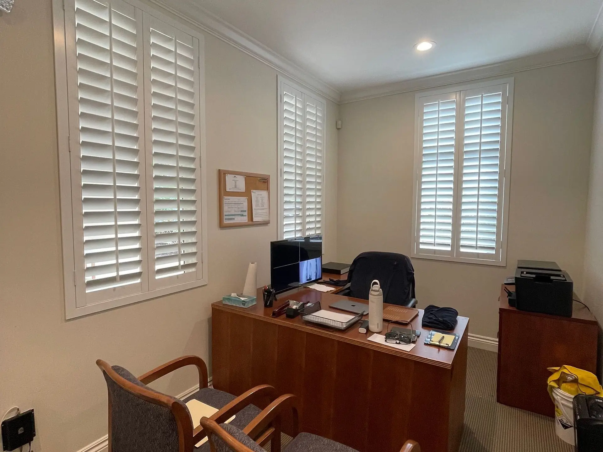 Bright office interior with desks and chairs