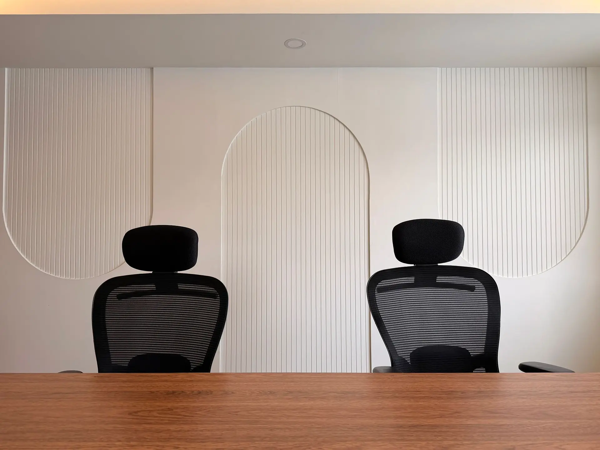 Minimalist office interior with workstations