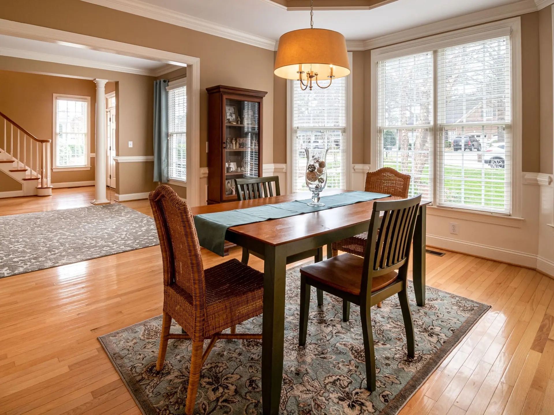 Wooden table standing on a patterned rug