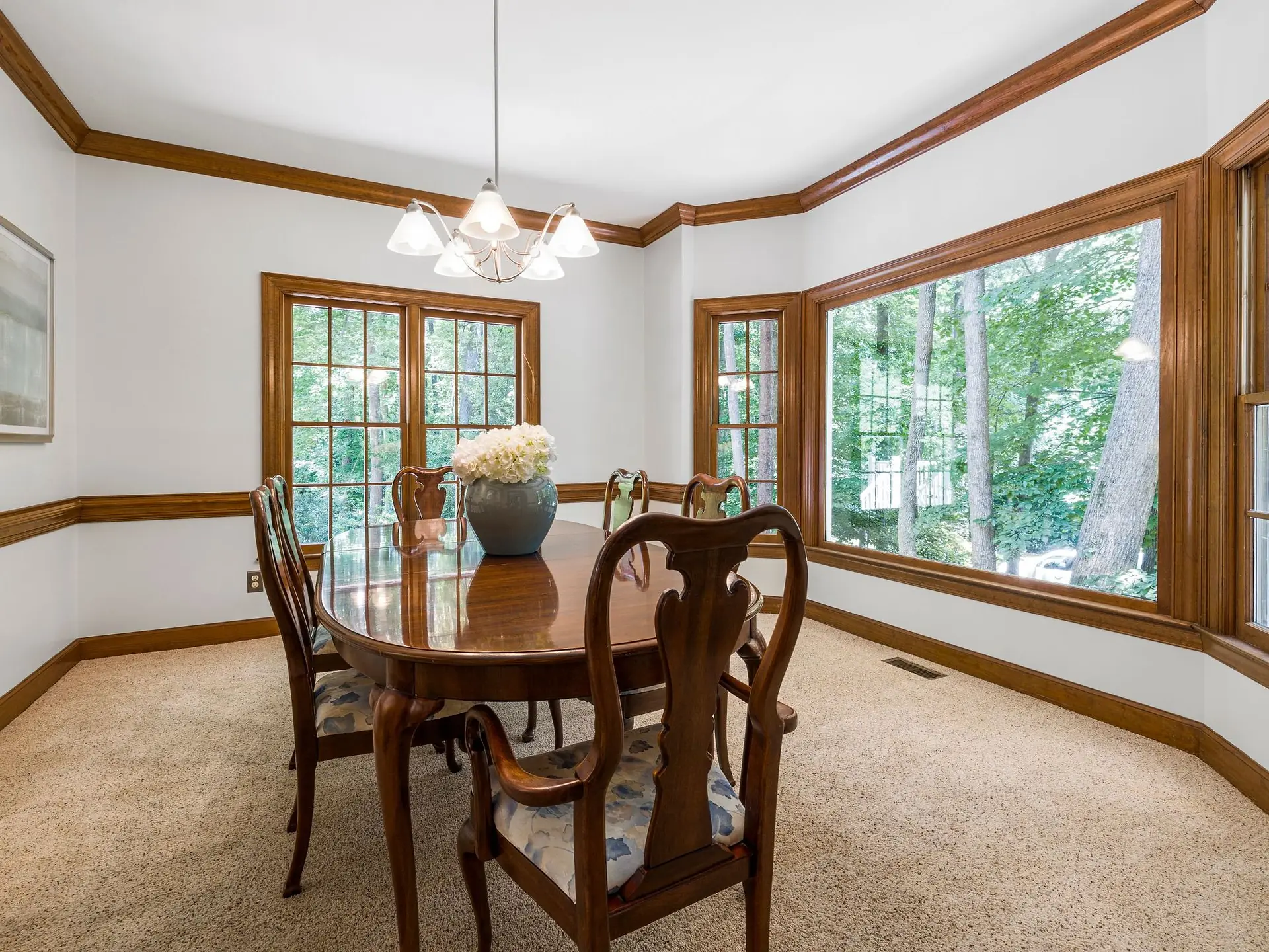 Table and chairs arranged in a bright room