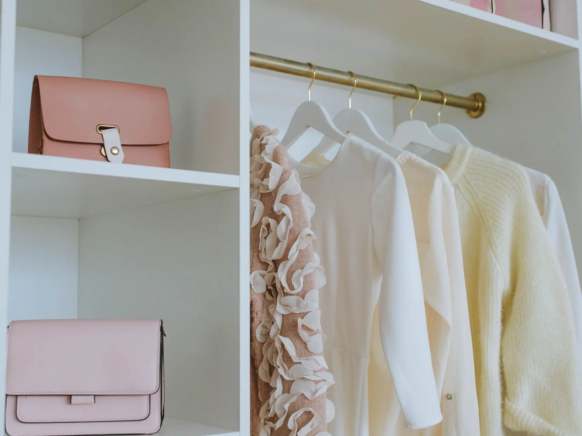 White fitted closet with shelves and drawers