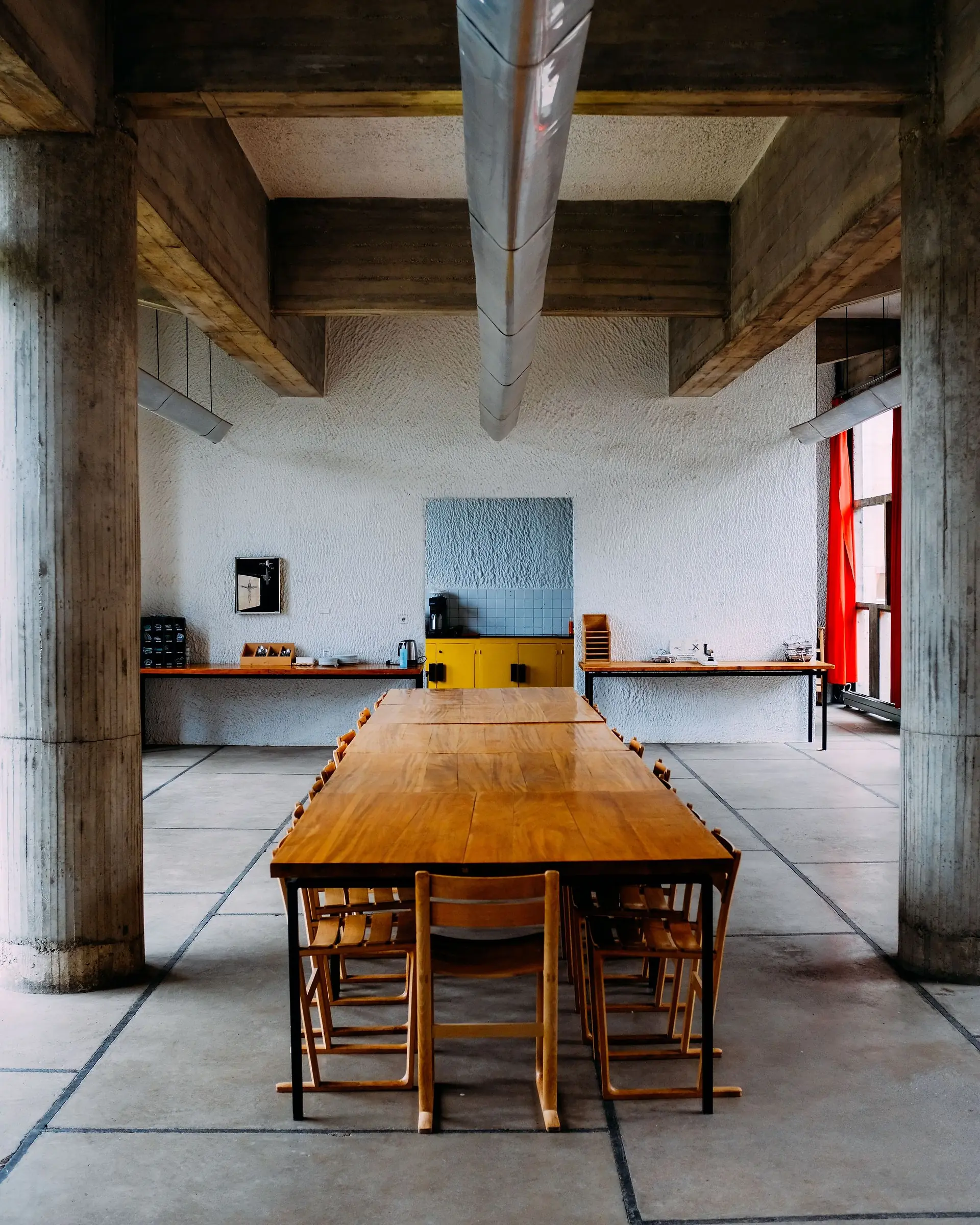 Dining room with a long wooden table and matching chairs